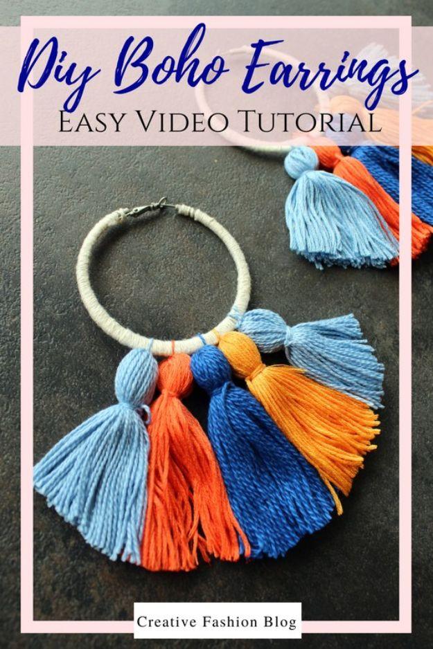 Cord wrapped hoop hung with fat orange, cobalt, yellow and pale blue tassels on a dark board, typeset title above