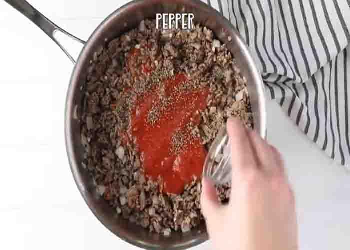 Cooking the ground beef for the sour cream noodle casserole