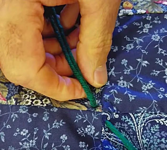 Make a hand tied quilt with yarn