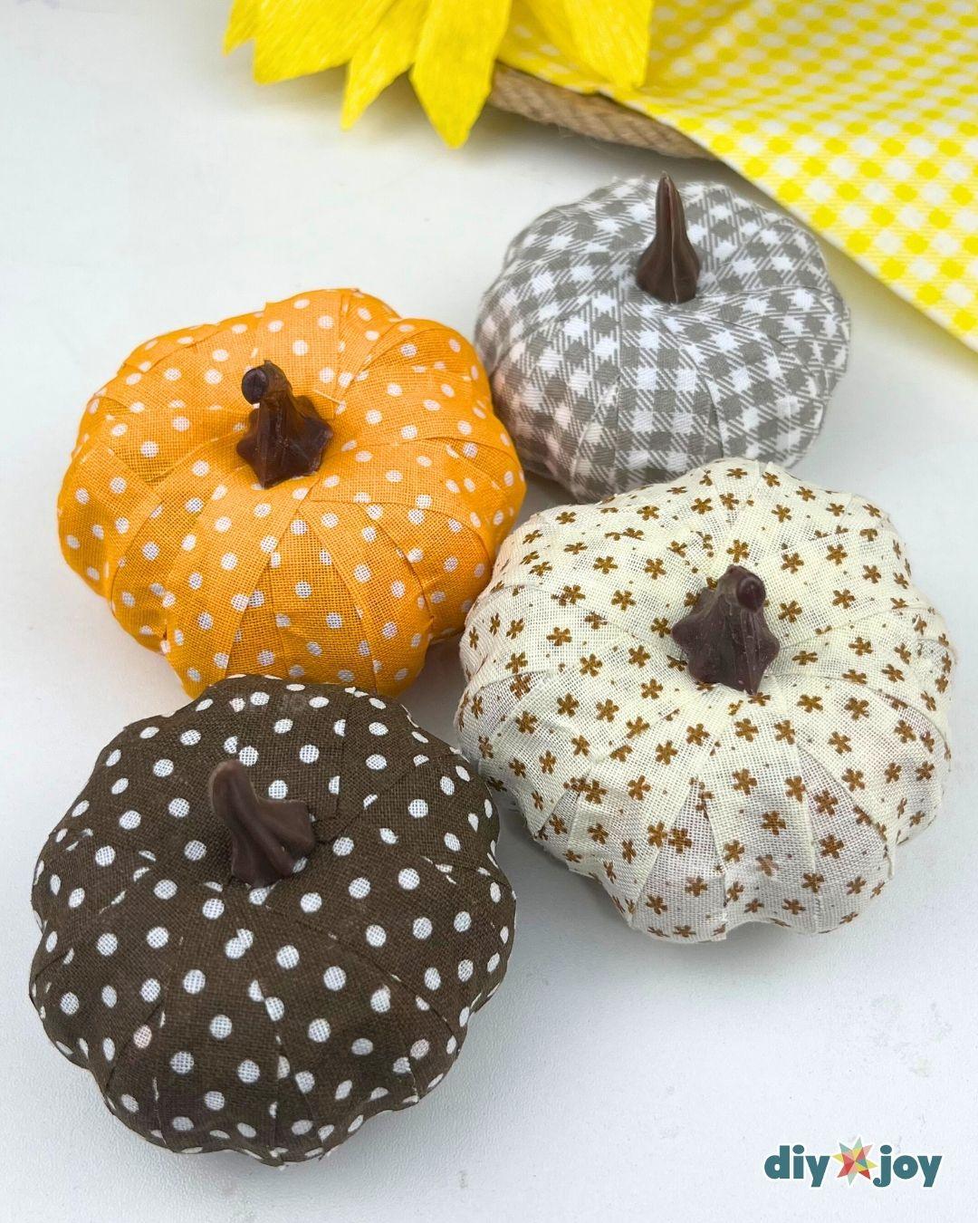 Thanksgiving Decor - four finished fabric pumpkins in orange polka dot, gray gingham and cream floral grouped together