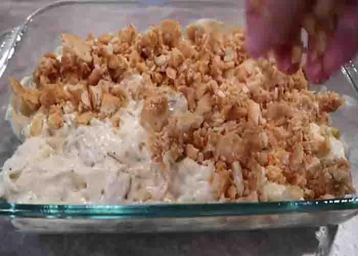 Assembling the poppy seed chicken casserole