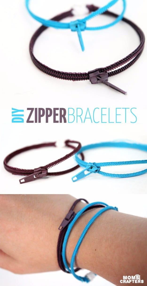 Two zipper bracelets in dark plum and turquoise with visible sliders, shown flat and stacked together on a wrist