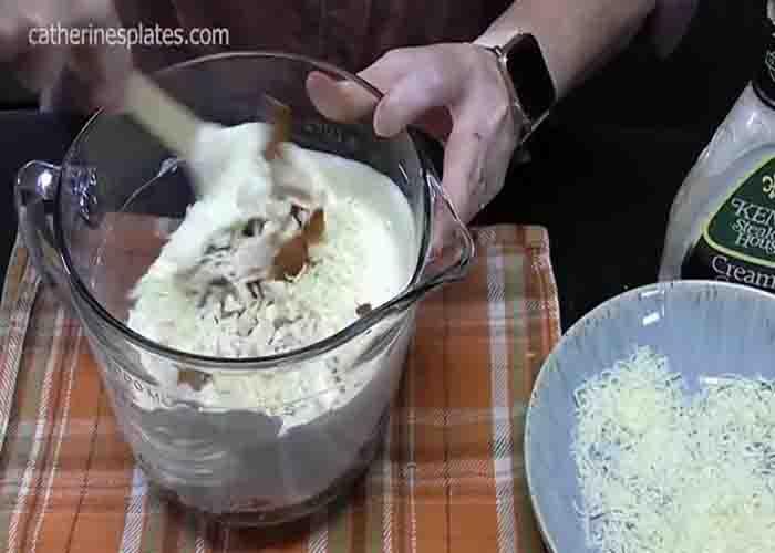 Combining all the ingredients for the filling of the chicken bake