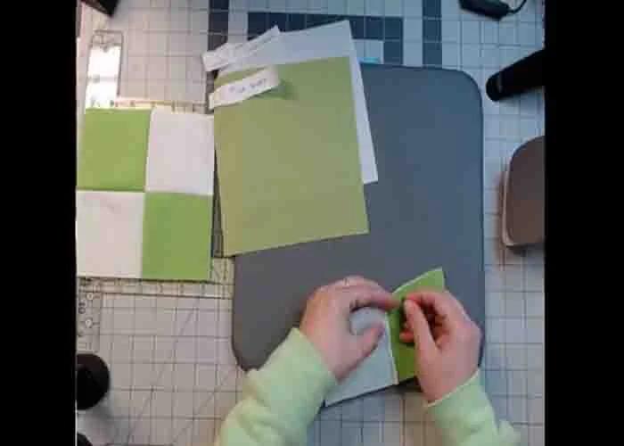 Making the four-patch for the railroad crossing quilt block