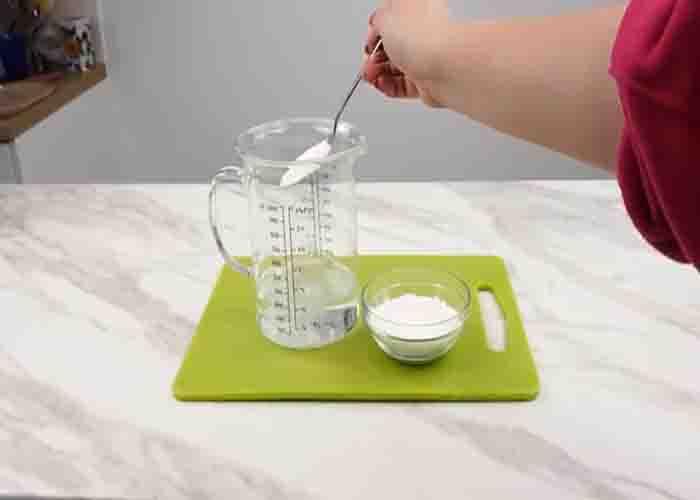 Making the homemade cleaning solution for yellows pillows