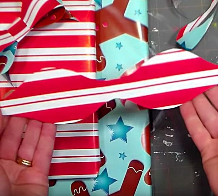Learn to make a cheap quick easy DIY Wrapping Paper Bow