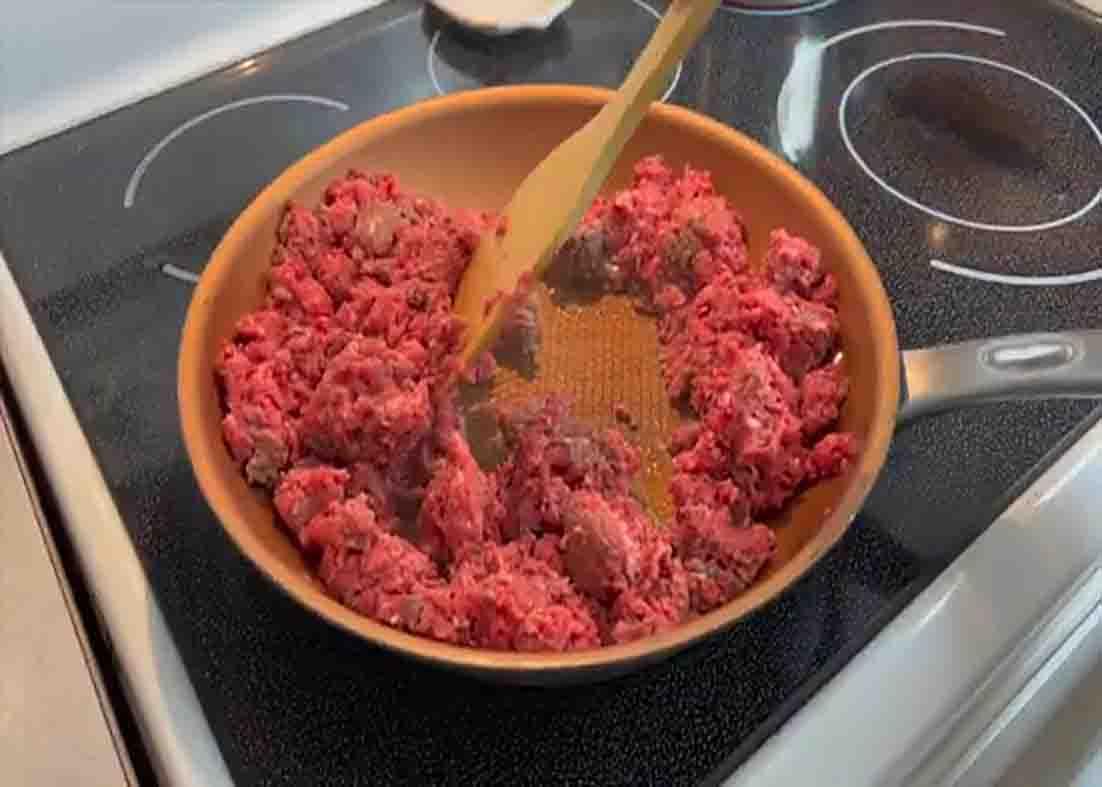Cooking the ground beef mixture for the casserole recipe