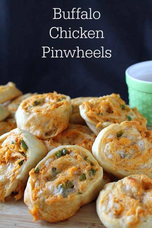 Buffalo chicken pinwheels made with crescent dough, sliced into spirals filled with shredded chicken and cheese