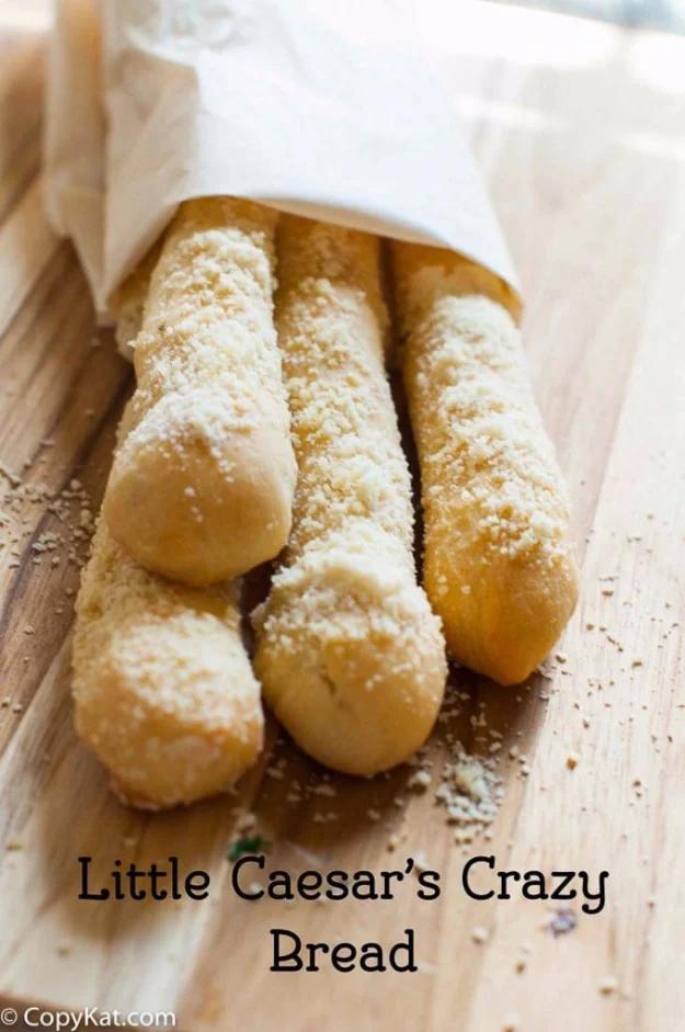 Little Caesar's crazy bread copycat, soft golden breadsticks brushed with garlic butter and parmesan