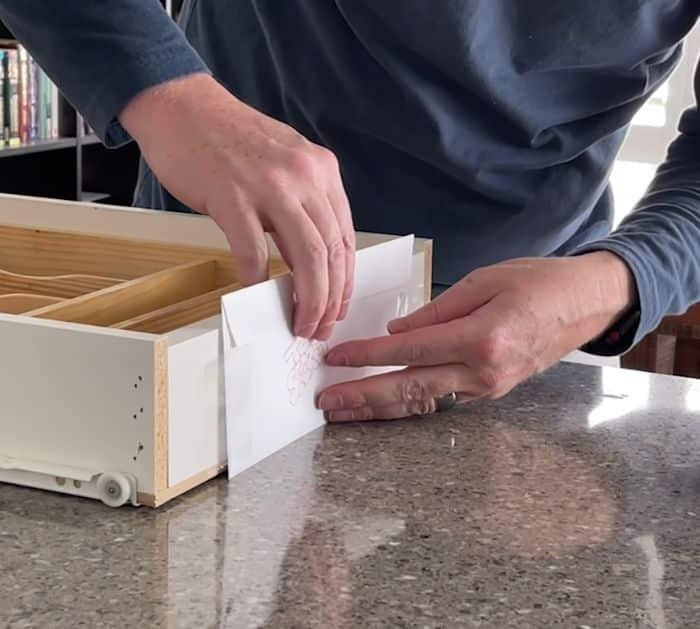Envelope behind a drawer