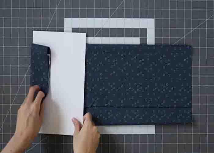 Using comic board in storing fabric yardage