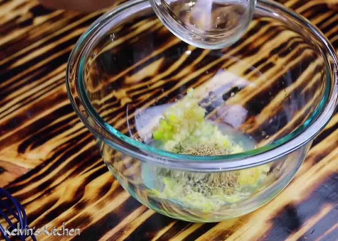 Combining all the herbs and spices for the chicken