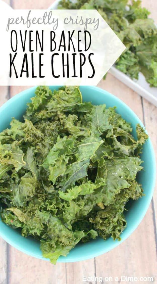 Oven baked kale chips piled in a turquoise bowl under a title graphic reading perfectly crispy kale chips