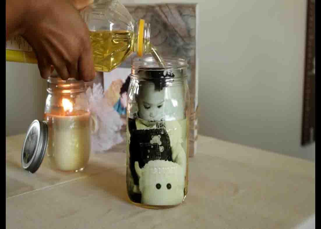 Filling the mason memory photo jar with vegetable oil