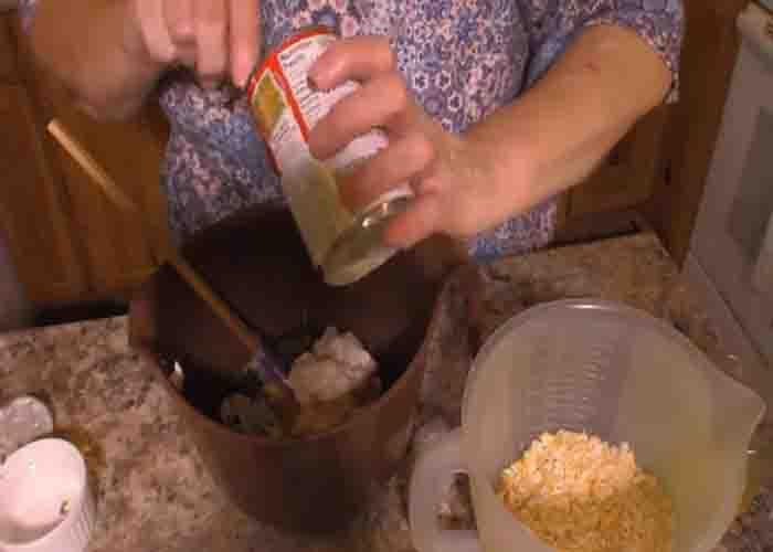 Mixing all the ingredients for the creamed spinach casserole