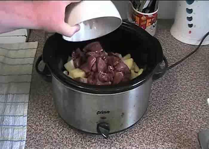 Adding the ingredients to the slow cooker