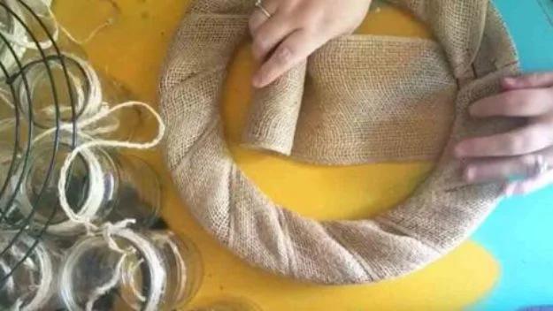 Burlap Mason Jar Chandelier, an easy burlap decor idea worth saving for later and a look worth copying this year