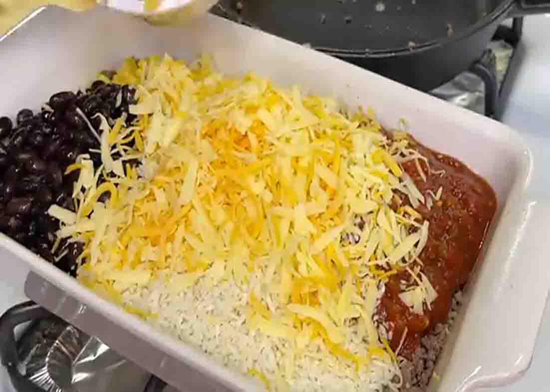 Mixing all the ingredients of the ground beef and rice casserole recipe