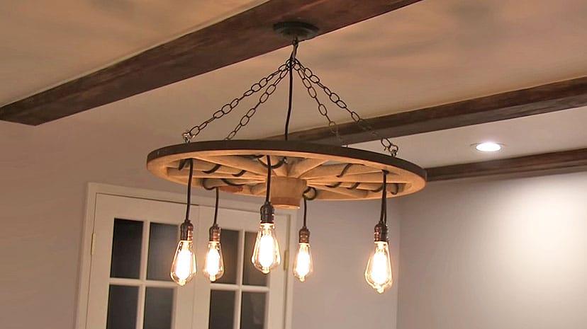 Upcycle A Wagon Wheel Into The Coolest Chandelier