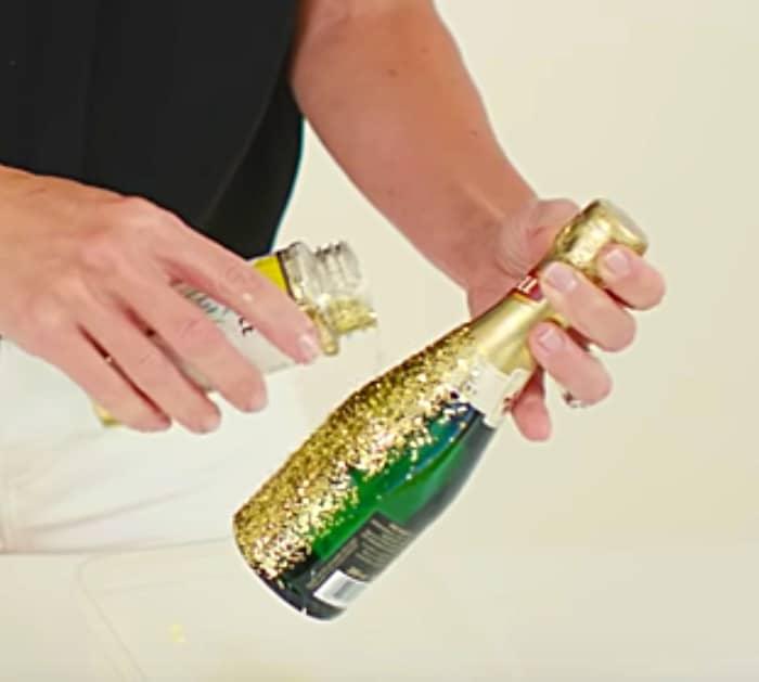 Learn to make easy cheap DIY Glitter Champagne Bottles