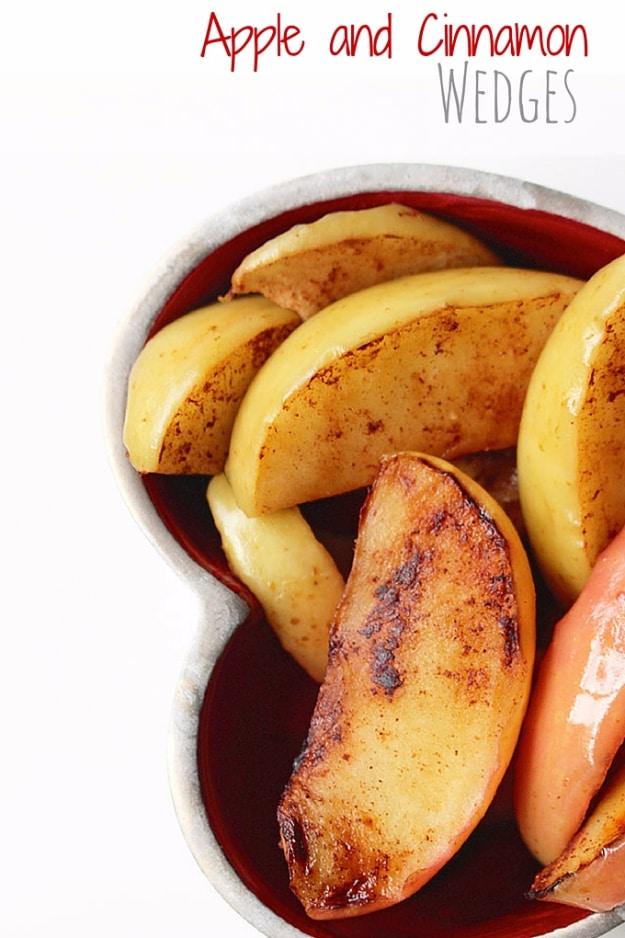 Apple and cinnamon wedges pan fried in coconut oil, a healthy quick dessert idea with no added sugar