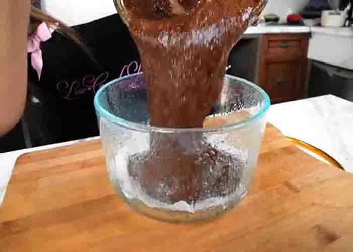 Pouring the cake batter into the cake pan