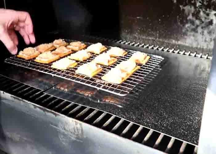 Grilling the candied bacon crackers
