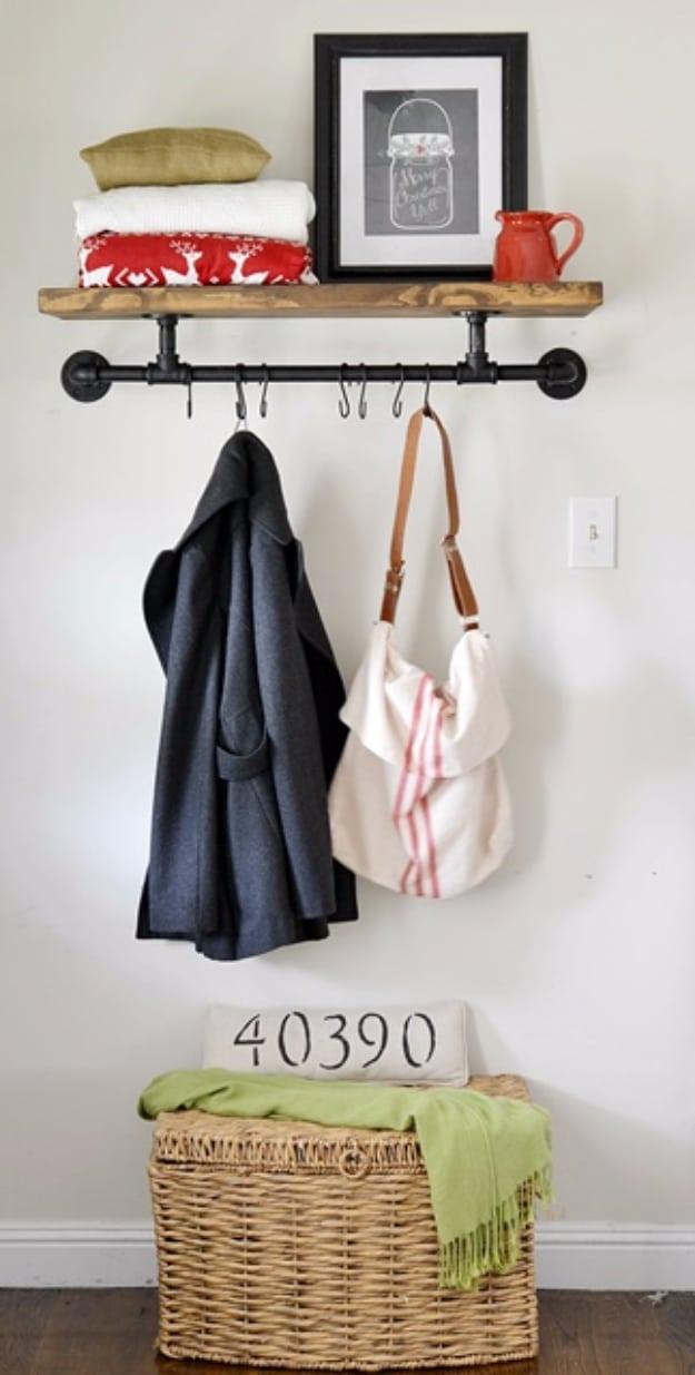 DIY Entryway Industrial Coat Rack, one of the best entryway decor ideas on this list and a clever idea worth trying at home