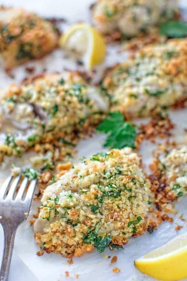 Baked breaded tilapia with garlicky golden breadcrumbs on a baking dish, a healthy easy baked fish recipe