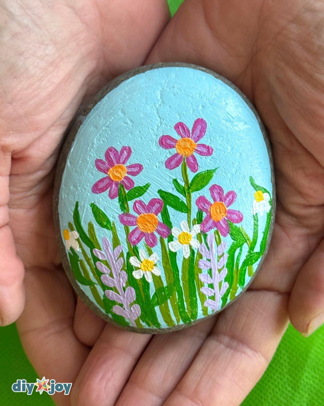 Flowers On Rocks — rock painting ideas