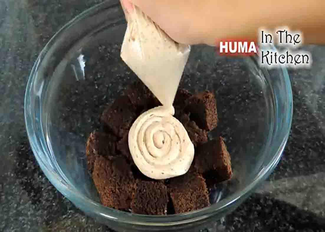 Assembling the brownie trifle dessert