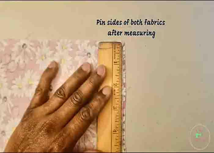 Measuring the fabric to make the drawstring bag
