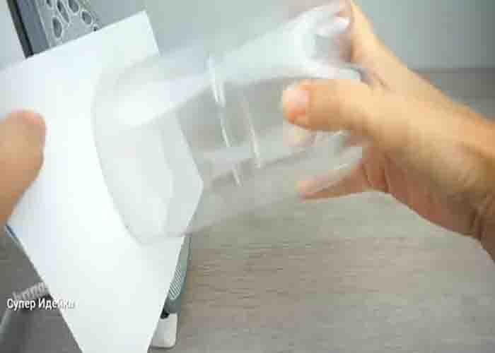Making the cookie container using an old plastic bottle