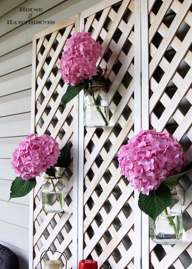 Mason Jar Vase on Lattice, a pretty DIY patio decor idea for outdoor living and a cozy touch for outdoor entertaining