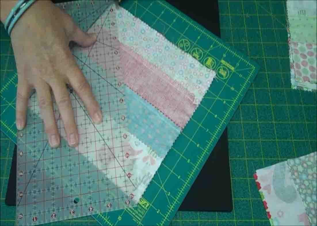 Cutting each blocks to form the 3 dudes squares pattern