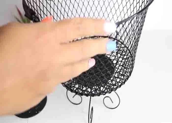 Assembling the first tier of the fruit basket