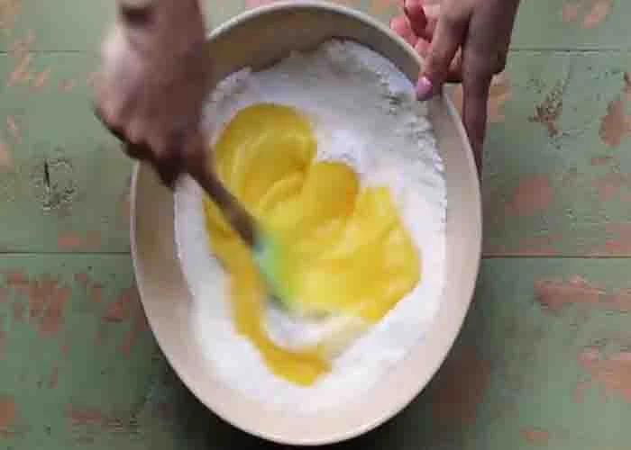 Combining the two ingredients for the lemon bars recipe