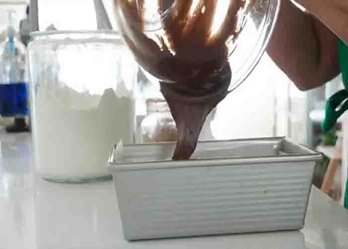 Making the brownie layer of the marshmallow brownie dessert