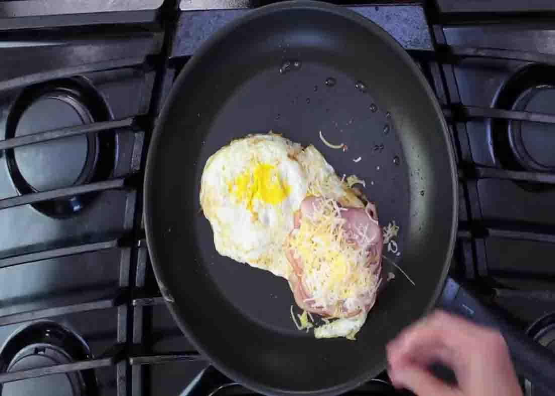 Adding ham and cheese to the breakfast sandwich