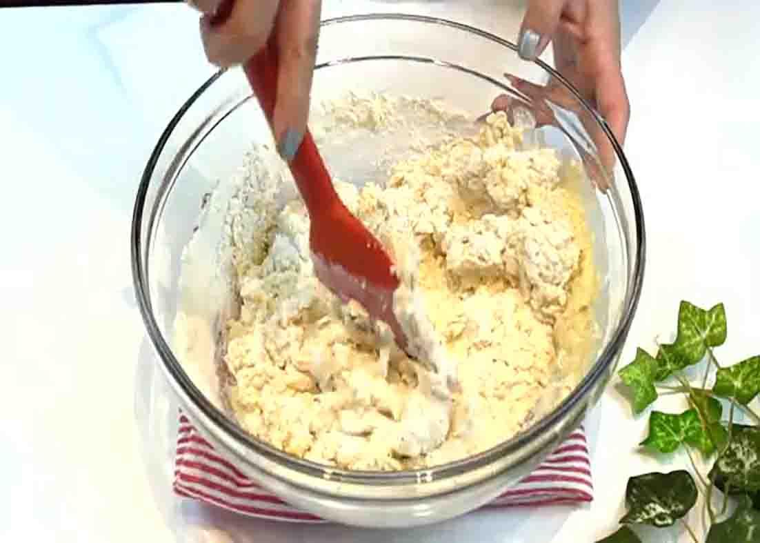 Mixing the flour mixture until dough forms