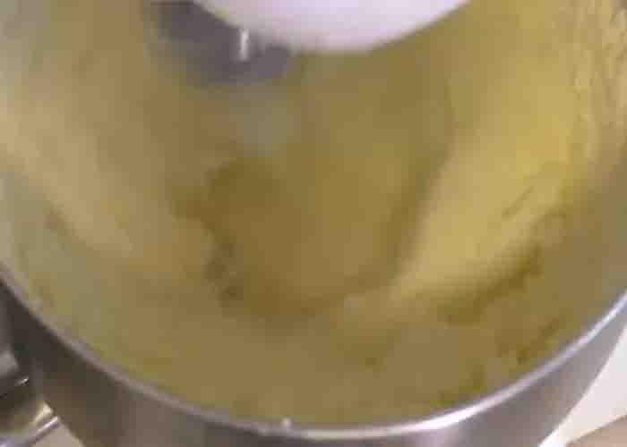 Mixing the pure cream to make homemade butter