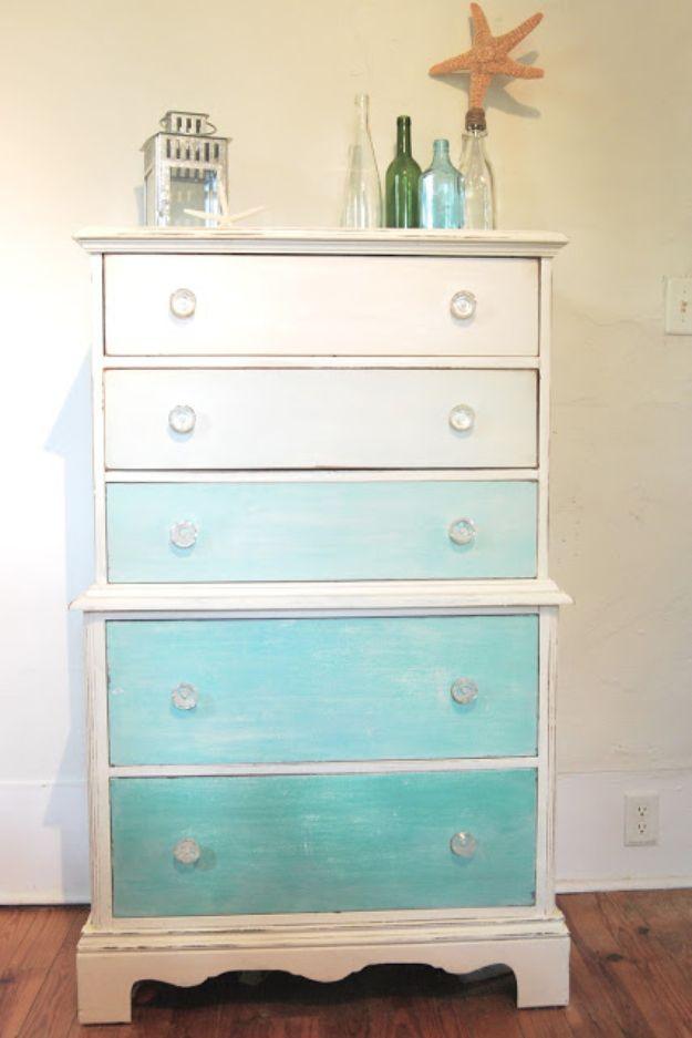 Five drawer dresser painted in an ombre fade from cream at the top down to deep teal at the bottom drawer