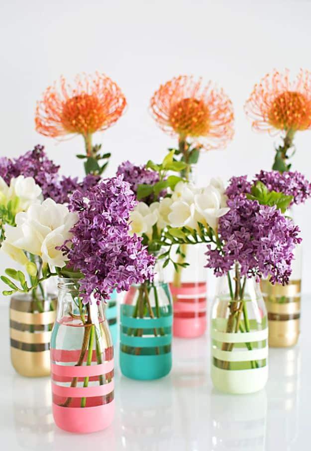 Glass bottle hand painted with a custom design for a decorative vase that makes a genuinely thoughtful handmade gift idea