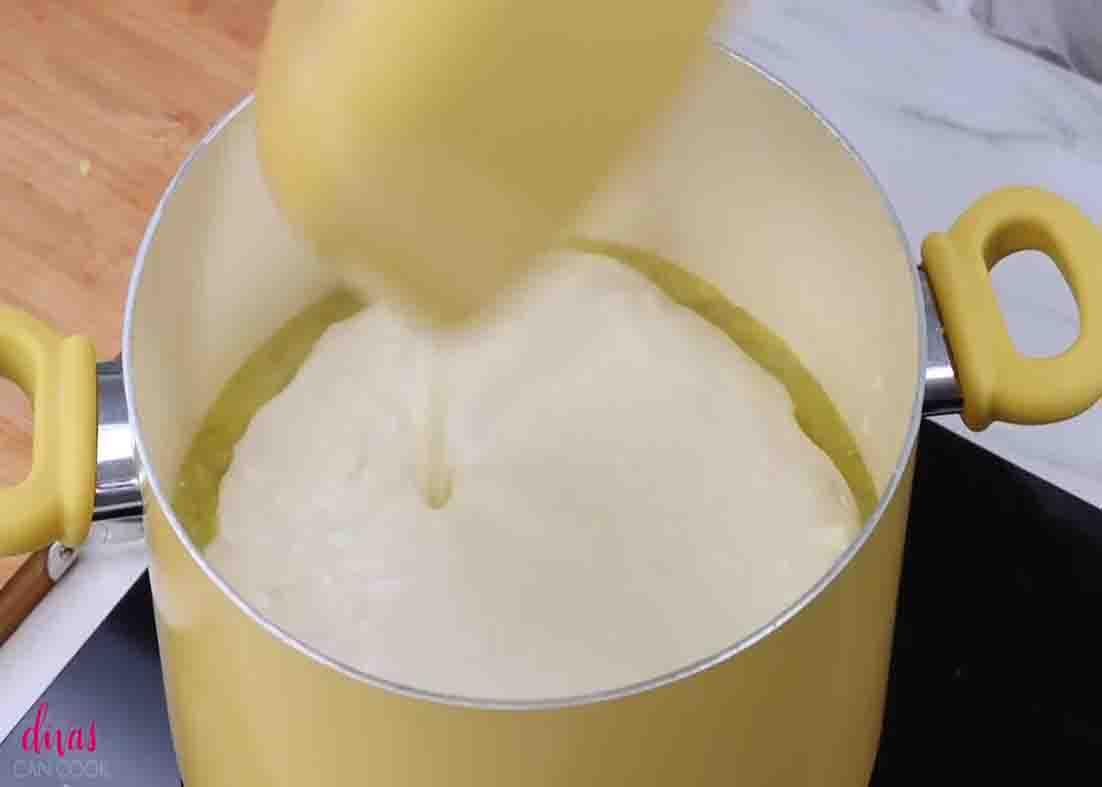 Adding the cream cheese mixture to the potato mixture