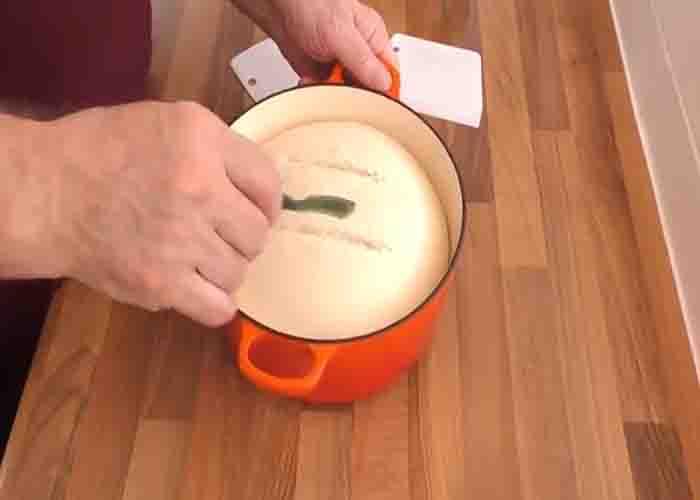 Scouring the top of the Dutch oven bread