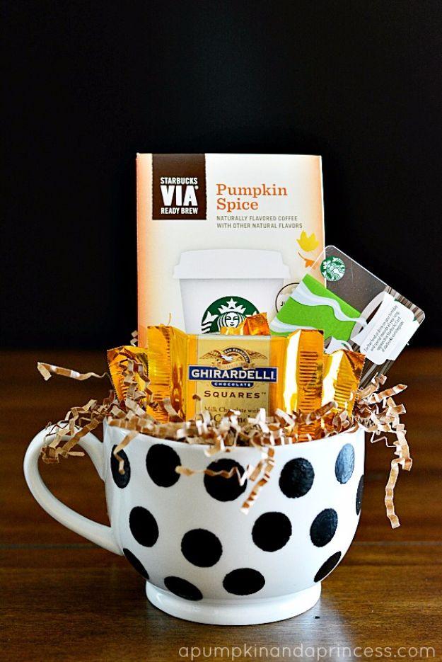 Polka dot coffee mug gift, a white mug painted with black dots filled with coffee packets, chocolate and a gift card