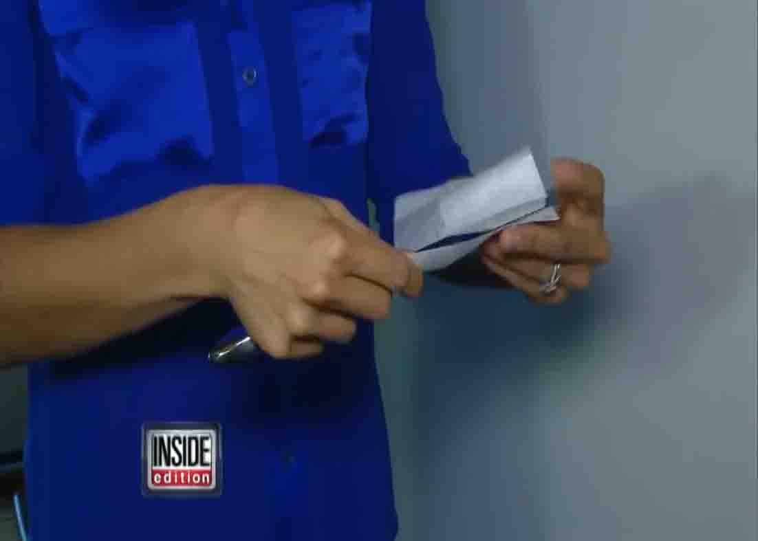 Cleaning the air vent with butter knife and dryer sheet