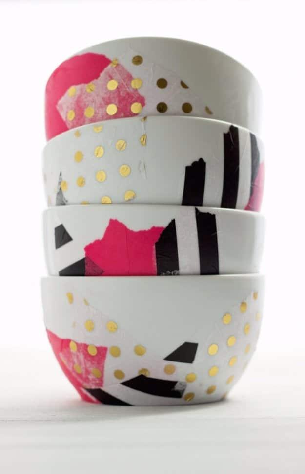 A shallow bowl molded from floral fabric stiffened with Mod Podge, sitting on a white counter holding a set of keys