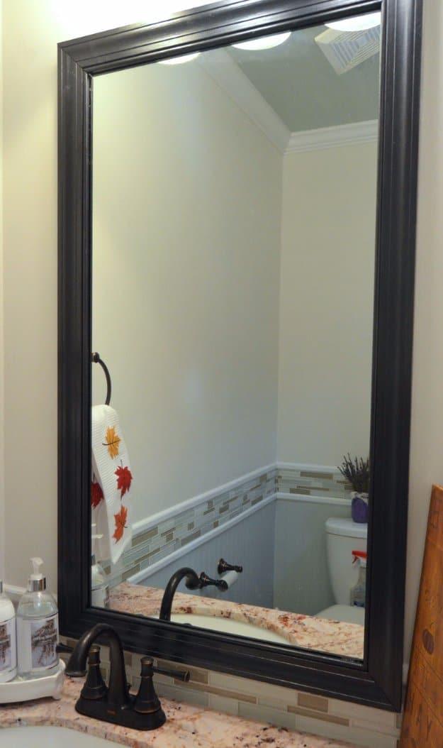DIY Clipped On Bathroom Mirror, an idea worth trying this season and one of the prettier picks from this roundup