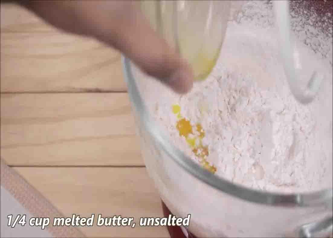 Combining the ingredients to make the cinnamon rolls